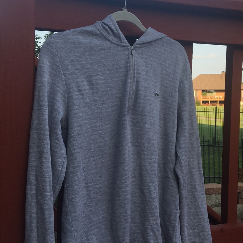 A Lacoste hoodie